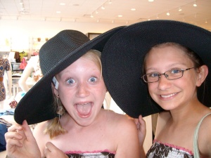 Abby and Leanna playing dress up at the Mall